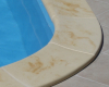 Promień krawędzi basenu R50cm, akcent w kolorze sztucznego piaskowca w kolorze żółtym