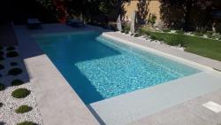 Baseny ceramiczne i zadaszenia firmy Aquapond.